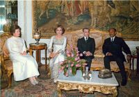 ShahanshahAryamehrShahbanouOfficialDinnerPresidentSadatDey1353a.jpg